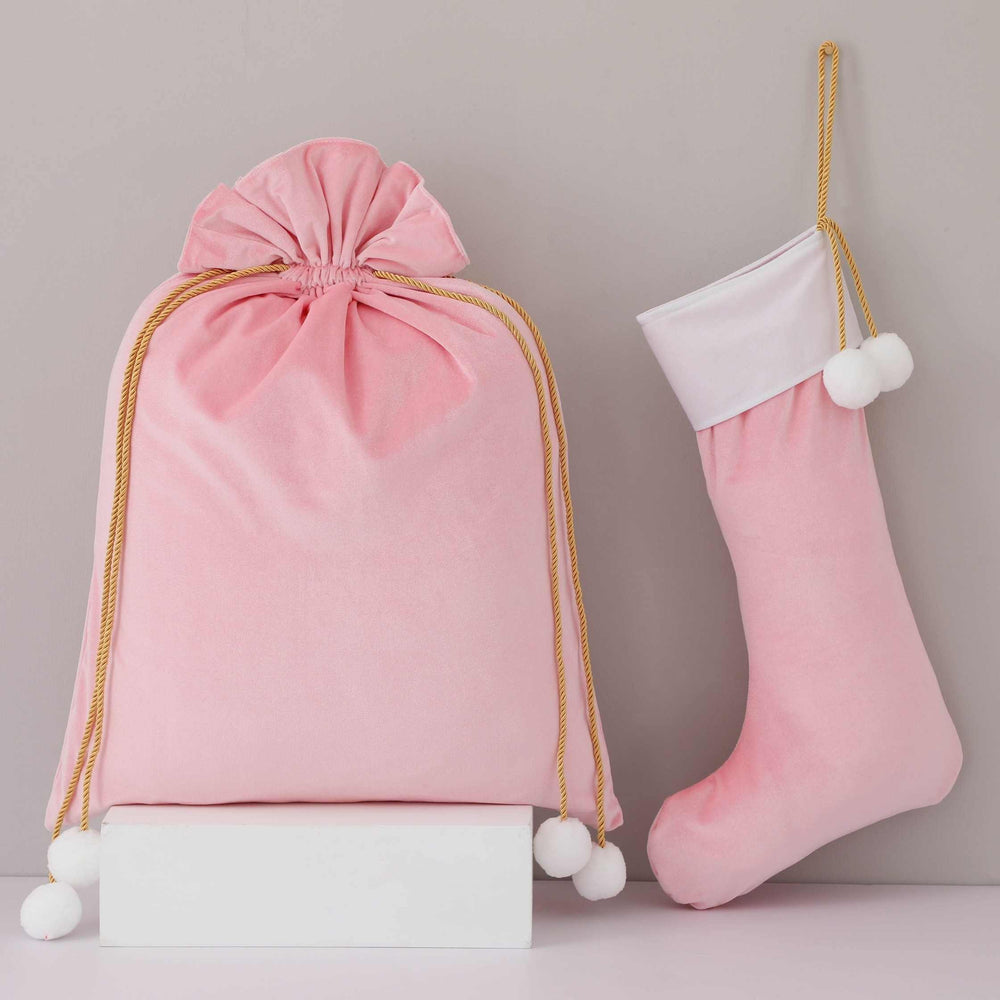 
                  
                    Load image into Gallery viewer, pink-velvet-santa-sack-with-pom-poms
                  
                